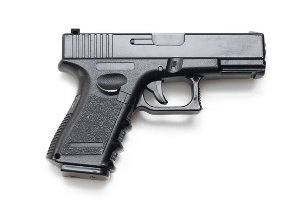 чорний пістолет ізольований на білому тлі
 - Фото, зображення