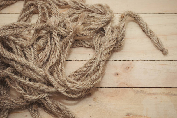 Aged rope on the old wooden pattern background - Foto, Imagem