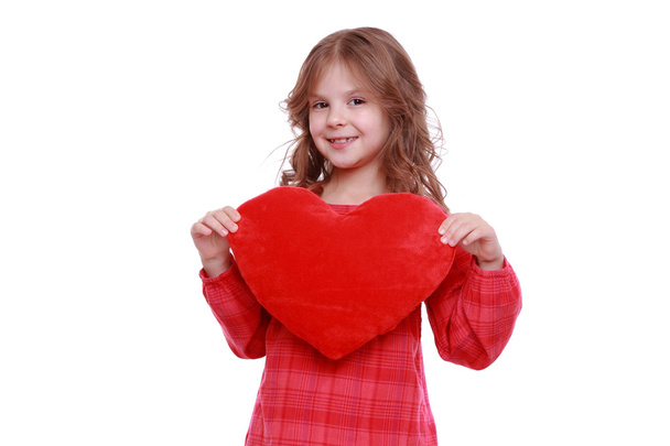 Girl holding a red heart - Foto, immagini