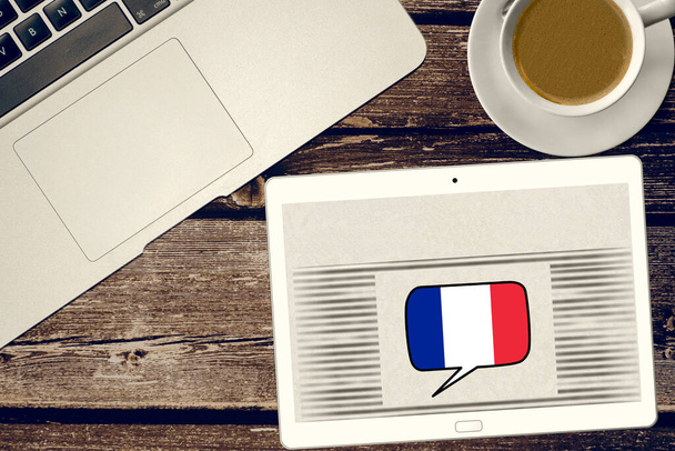 Ein Tablet-PC und Französisch lernen - Foto, Bild