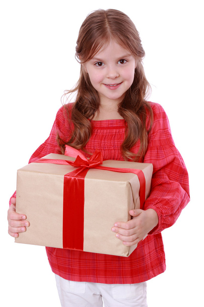 Smiling girl holding present - Photo, Image