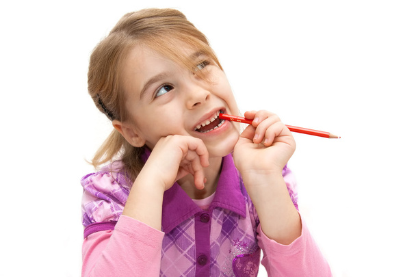słodkie dziewczynki z ołówkiem w ręku - Zdjęcie, obraz