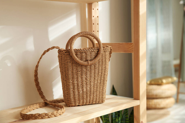 Stylish woman's bag on shelf in boutique - Foto, Imagen