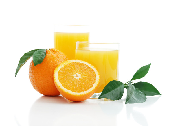 Orange juice and oranges - Photo, Image