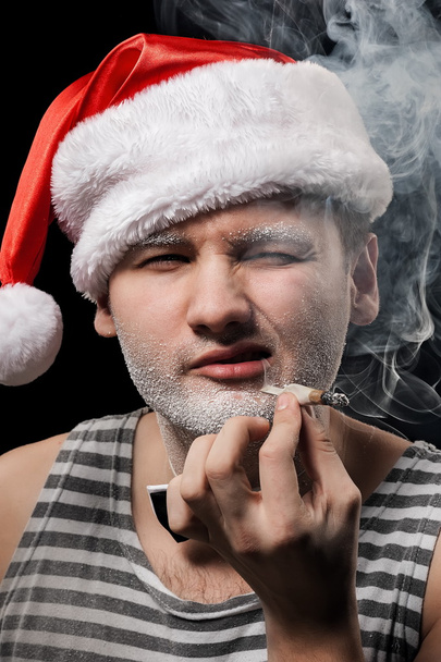 Santa Claus with a cigarette - Foto, afbeelding