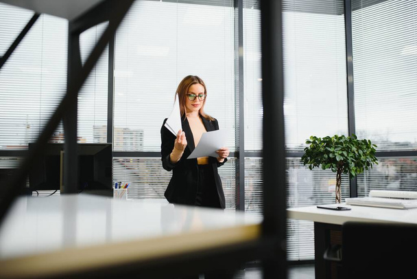 Portrait of modern business woman in office - Photo, image