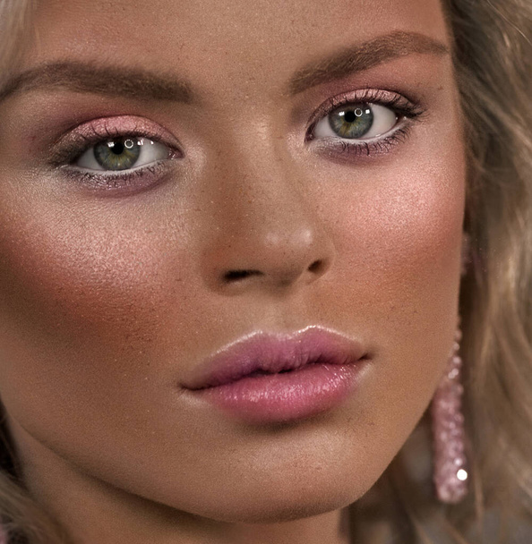 Face close-up. Woman, portrait. Pink blush, green eyes. - Foto, Imagem