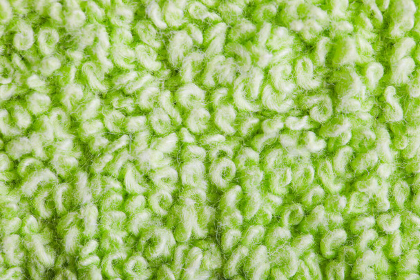 Textura de toalla de rizo verde de cerca - Foto, imagen