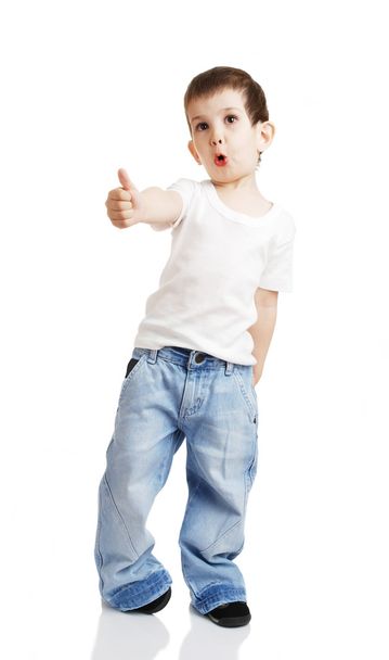 Little boy showing thumbs up - Foto, immagini