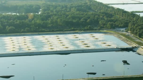 Aerial view of effluent settling ponds at Industrial Paper pulp Mill site waste being processed after the pulping of timber USA - Footage, Video