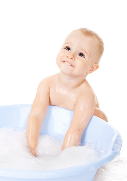 Little boy bathes in a bath with foam - Φωτογραφία, εικόνα
