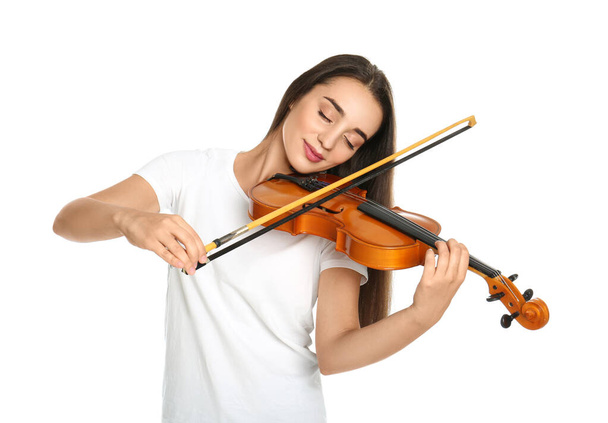 Beautiful woman playing violin on white background - 写真・画像