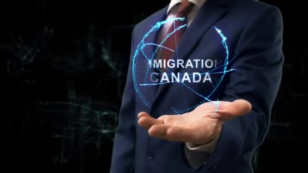 Бізнесмен показує концепцію голограми Immigration Canada - Кадри, відео