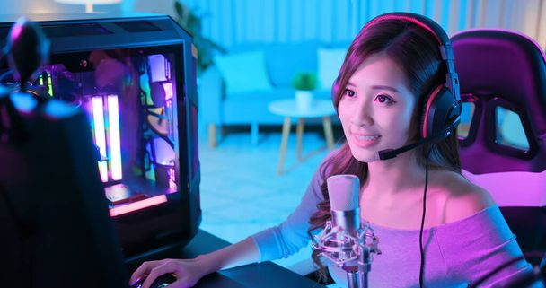 Young Asian Pretty Pro Gamer have live stream and chat with fans happily at home - Φωτογραφία, εικόνα