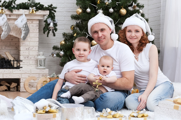 Family near Christmas tree - Foto, immagini