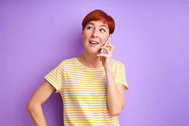 redhead adult woman talk on phone - Photo, image