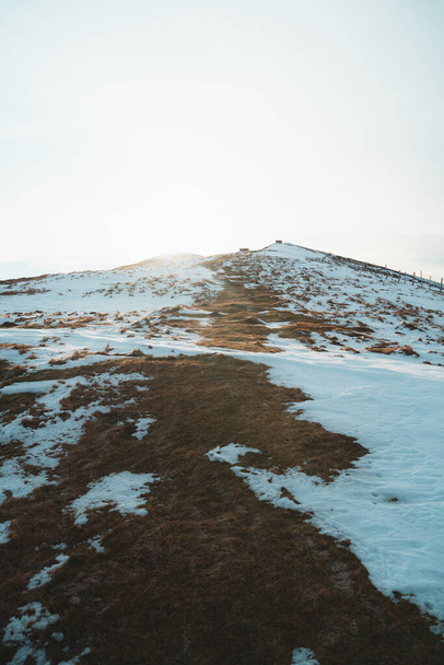Snowy path on the hills of Larrau on a sunny morning - Фото, изображение