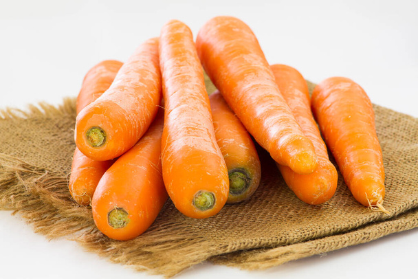 fresh carrots isolated on white background - Фото, изображение