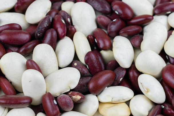 mixed white and red beans. background or texture\ - Valokuva, kuva