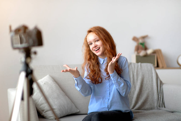 Red-Haired Teen Girl Recording Her Blog, Talking To Camera - Zdjęcie, obraz