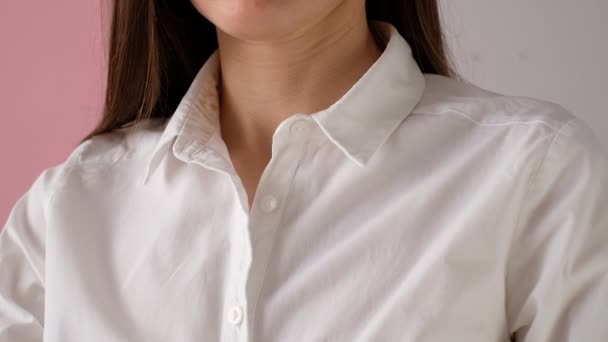 cosmetic stain on the collar of a girls shirt.  - Footage, Video