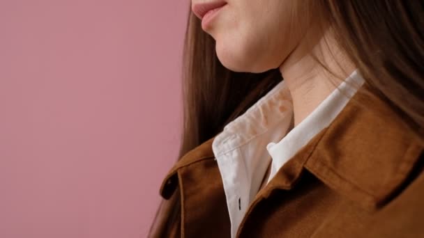cosmetic stain on the collar of a girls shirt.  - Footage, Video