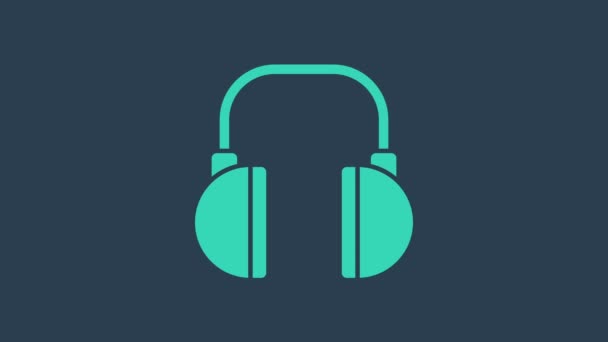 Turkusowa ikona słuchawek odizolowana na niebieskim tle. Słuchawki. Koncepcja słuchania muzyki, obsługi, komunikacji i operatora. 4K Animacja graficzna ruchu wideo - Materiał filmowy, wideo