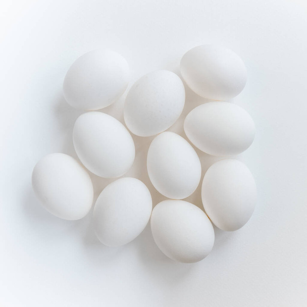 Group white fresh eggs, isolated on white background - Photo, Image