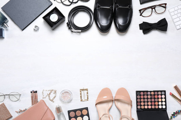 Male and female accessories on white background, flat lay. Space for text - 写真・画像