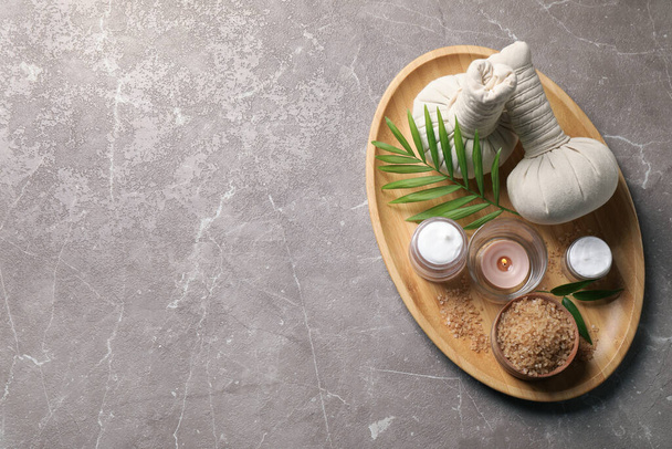 Tray of spa items on grey table, top view. Space for text - Fotografie, Obrázek
