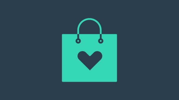 ブルーの背景にハートアイコンを隔離したターコイズショッピングバッグ。ショッピングバッグ店はハートアイコンのような愛。バレンタインデーのシンボル。4Kビデオモーショングラフィックアニメーション - 映像、動画