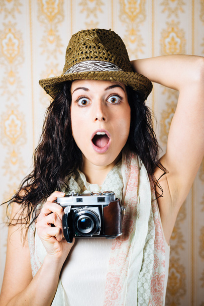 Hipster jaw dropped woman with camera - Foto, Imagem