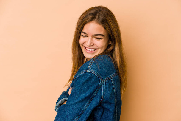 Young skinny caucasian teenager girl laughing and having fun. - Fotó, kép
