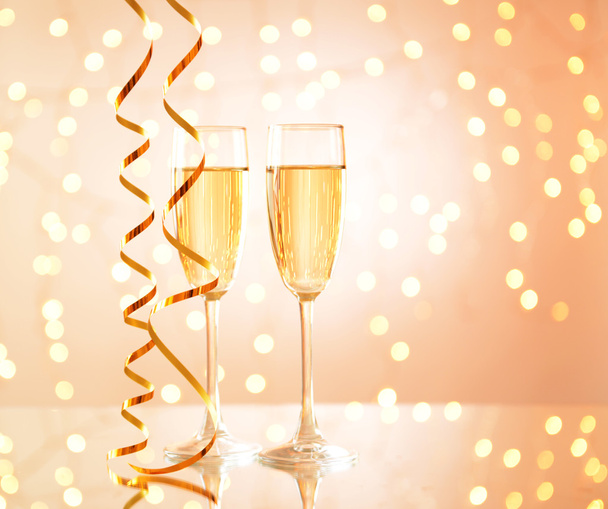 Glasses of champagne on shiny background - Foto, immagini