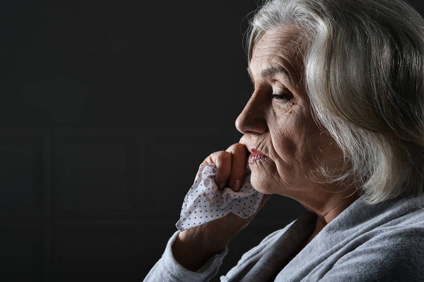 Close up portrait of sad senior woman - Фото, изображение