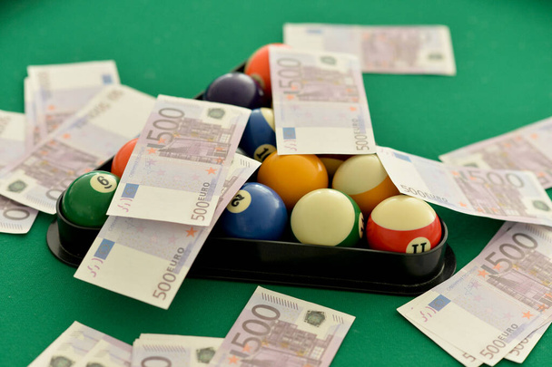 billiard balls and euros, concept  - Фото, изображение