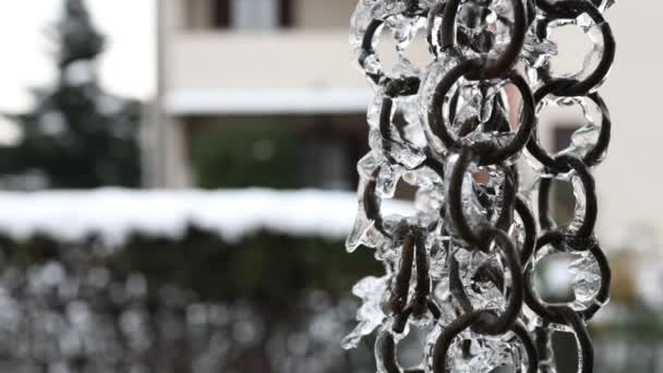 macro close-up of an icy chain, of a gutter drain of a house - Footage, Video