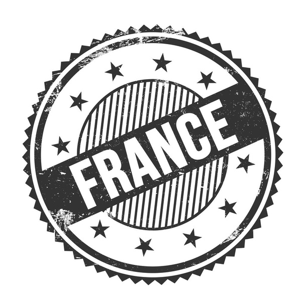 FRANCE text written on black grungy zig zag borders round stamp. - Foto, afbeelding