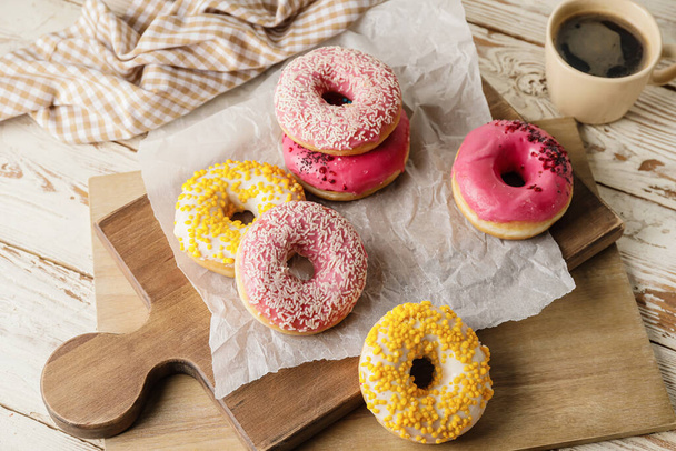 Sweet tasty donuts on table - Foto, Imagen