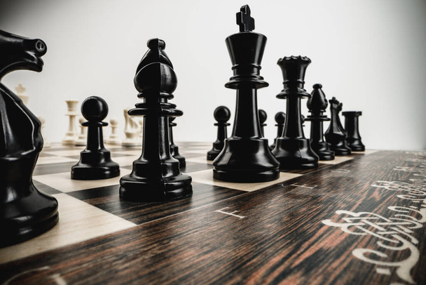 Macro photo of chess pieces on a chess board - Φωτογραφία, εικόνα