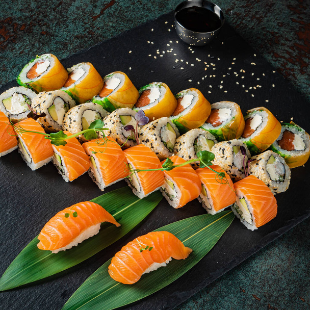 sushi set on the black background - Fotó, kép