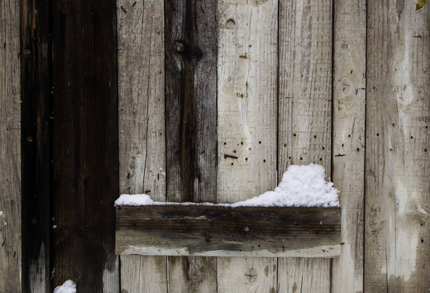 Wood detail on a snow-stained winter day - Fotoğraf, Görsel