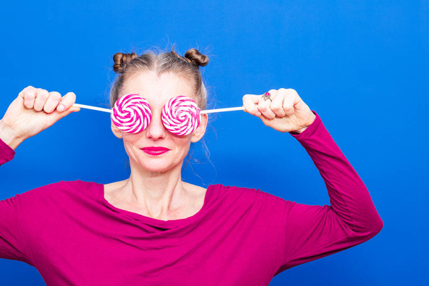 colorful picture of woman with lollipops - Foto, Bild