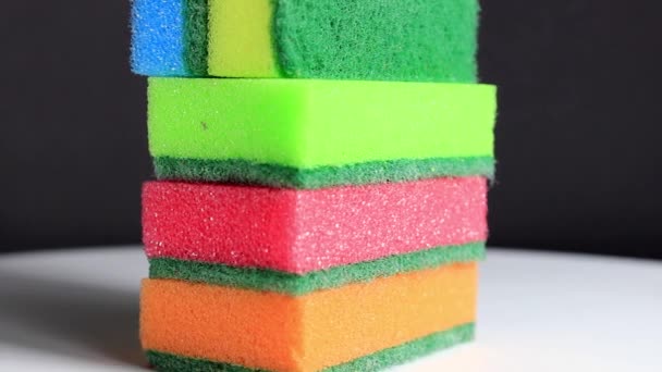 Colored household sponges for washing dishes. Close-up. - Footage, Video