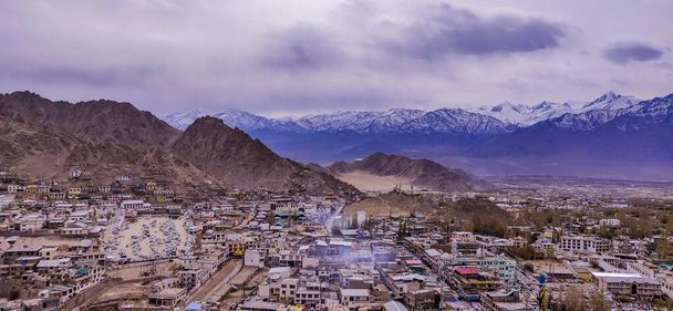 View landscape and cityscape of Leh Ladakh Village with Himalaya mountain range from viewpoint of Leh Stok Palace while winter season in Jammu and Kashmir, India - Фото, зображення