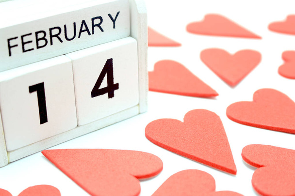 wooden calendar show of February 14 with red heart for valentine day background - Foto, Imagen