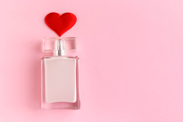 Perfume with hearts as a gift for valentine's day with copy space - Fotó, kép