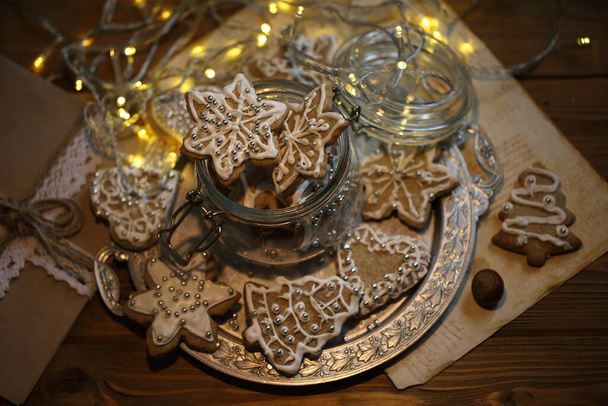 Gingerbread cookie with white icing - 写真・画像
