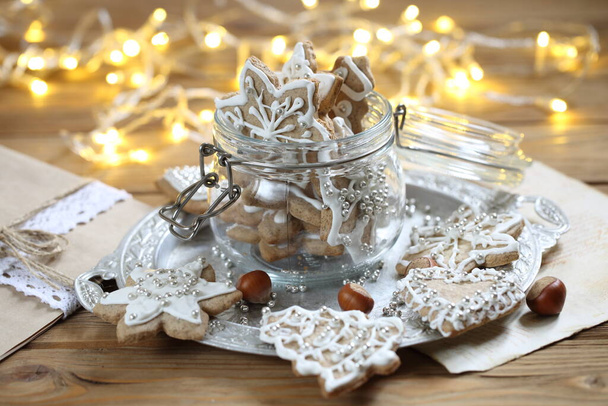 Gingerbread Cookie with Christmas Garland Lights - Photo, Image