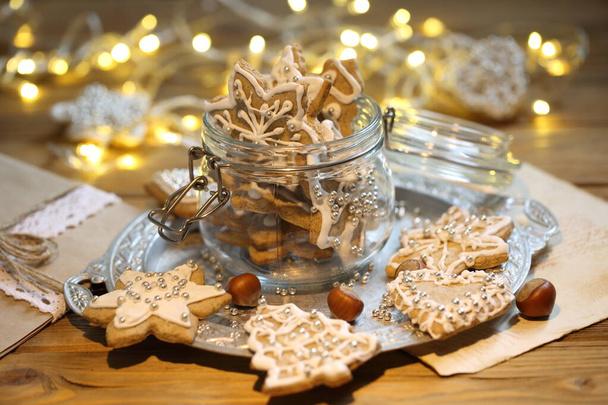 Gingerbread Cookie with Christmas Garland Lights - Valokuva, kuva